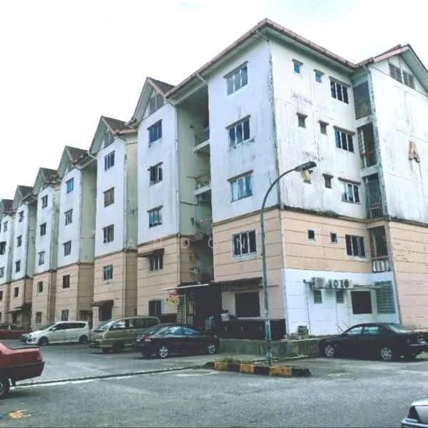 Exterior type: low-rise apartment block; features: white painted facade, cream painted facade, flat roof, approximately 3-storey, parking area in front, multiple windows, balconies on upper floors, entrance with signage; style: traditional.