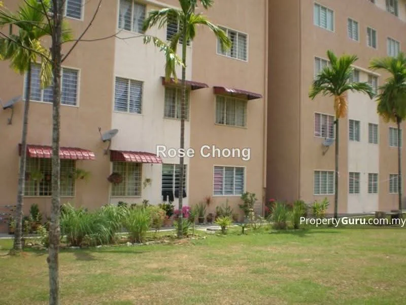 Exterior type: low-rise apartment block; features: cream painted facade, brown painted facade, window grills, awnings over windows, landscaped garden, mature palm trees, flower beds, grass lawn; style: modern.