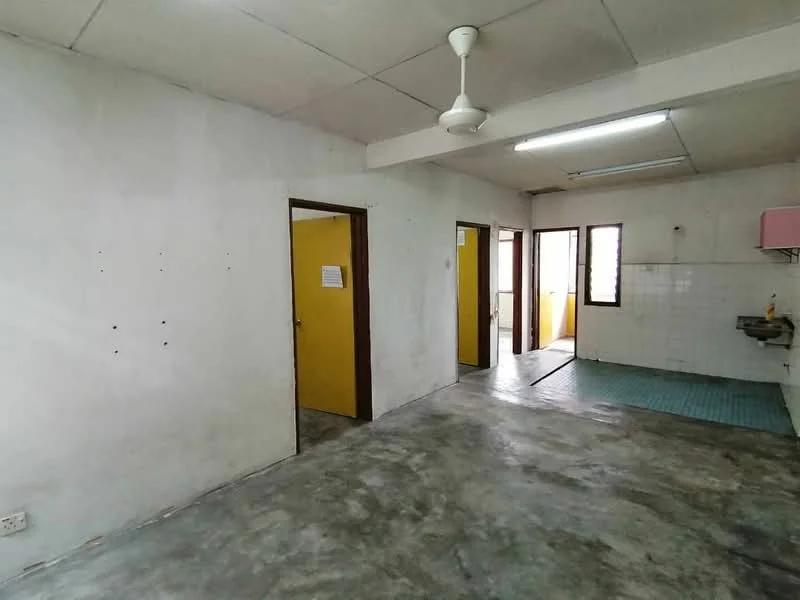 Room features: white painted walls, concrete flooring, ceiling fan, window with natural light, doorway leading to another room, doorway leading outside, kitchen area with wall tiles, sink in kitchen area; style: minimalist.