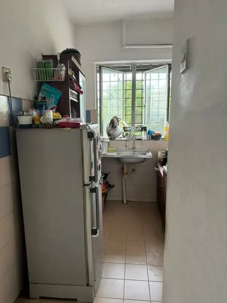 Kitchen features: stainless-steel fridge, single-bowl sink, chrome pull-down faucet, wood cabinetry, countertop, window with metal grille, tile flooring, wall-mounted shelving, various kitchen utensils and items on counter; view: garden.