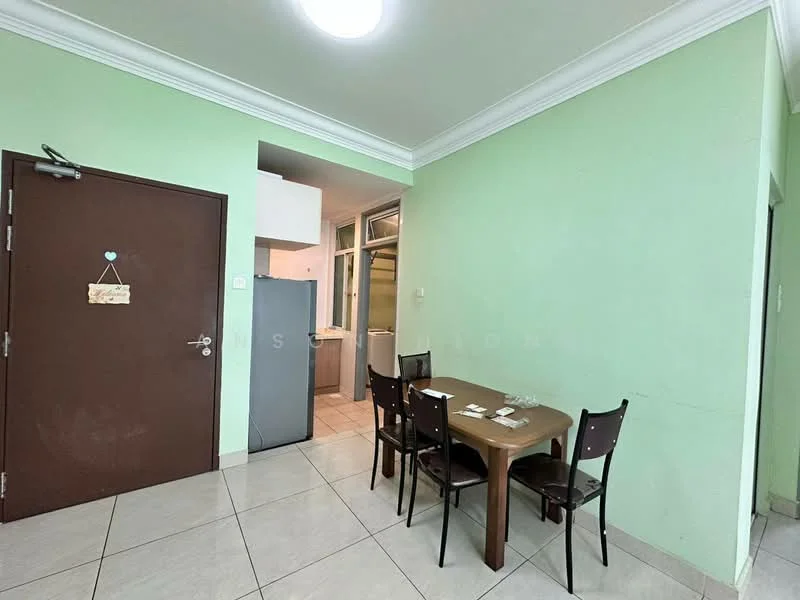 Dining features: green painted walls, tile flooring, round dining table, 4 dining chairs, refrigerator, door to hallway, light fixture on ceiling. Room features: window, washing machine, kitchen area visible.