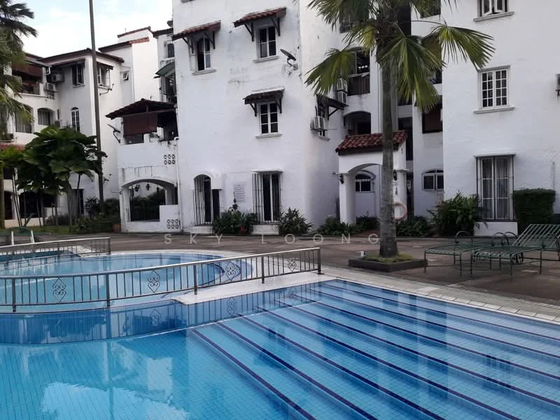 Exterior type: low-rise apartment block; features: white painted facade, red tiled roof, multiple balconies, swimming pool with blue tiles, pool deck with loungers, manicured landscaping, palm trees, surrounding greenery; style: tropical-modern.