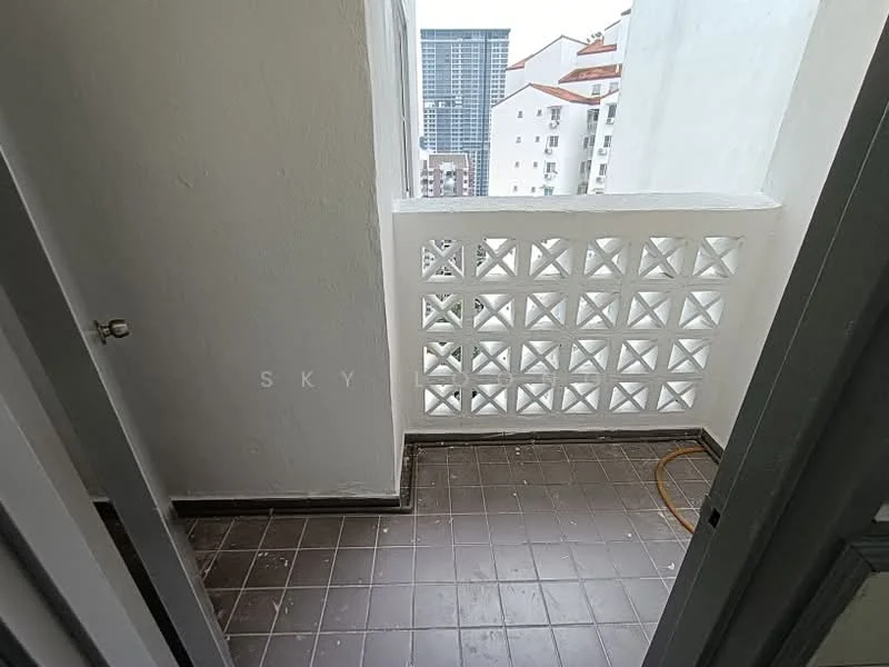Balcony features: grey tiled flooring, white painted walls, decorative block wall, city view, door leading to interior space; view: city.