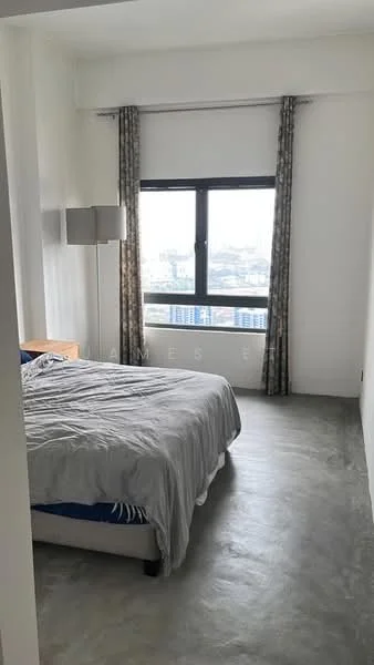 Bedroom features: king-size bed with grey bedding, floor-to-ceiling window, curtains with geometric pattern, concrete flooring, nightstand with lamp, decorative wall, minimalist decor, city view; style: modern; view: city.