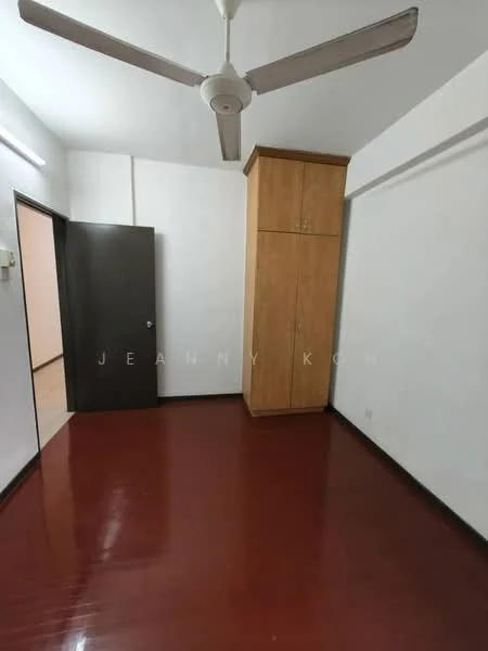 Room features: wooden flooring, white painted walls, ceiling fan, built-in wardrobe with wooden finish, single door, light fixture on ceiling.