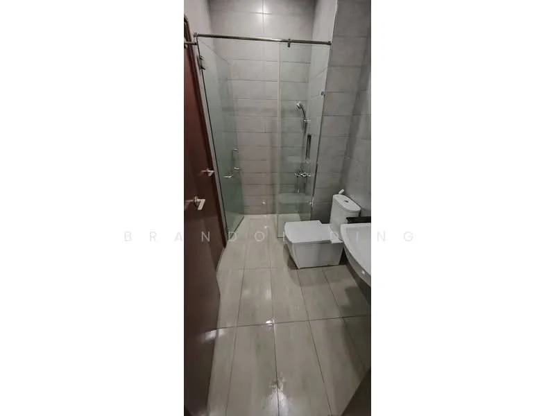 Bathroom features: glass shower enclosure, rain shower head, handheld shower, white toilet, single-sink vanity with white cabinet, mirror above vanity, grey tiled walls, light grey floor tiles, chrome faucet, built-in shelving, towel rail; style: modern.