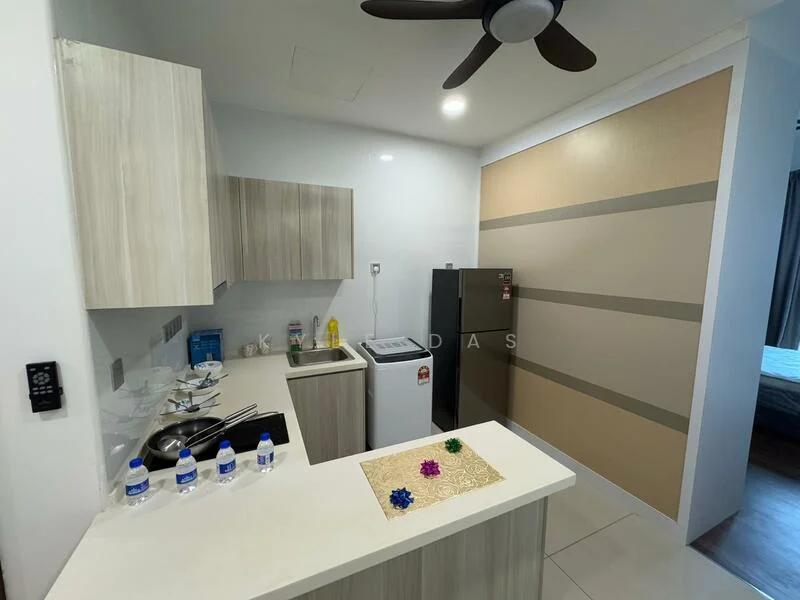Kitchen features: light wood cabinetry, white countertop, stainless-steel sink, chrome faucet, built-in refrigerator, top-load washing machine, ceramic tile flooring, 5-blade ceiling fan, wall-mounted electrical outlets, decorative placemat, bottled water, grey accent wall; style: modern.