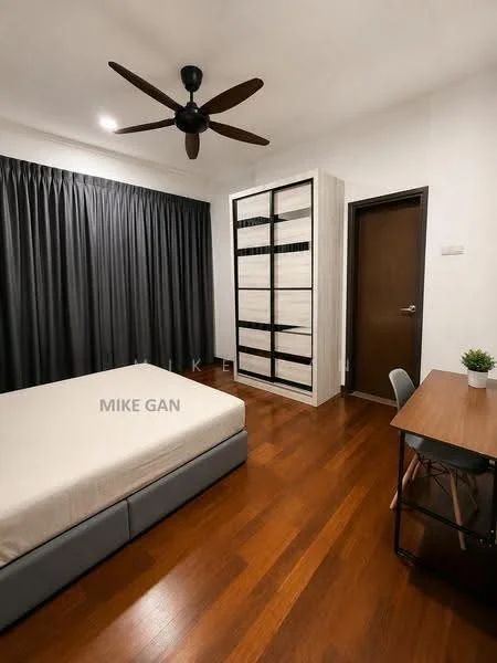 Bedroom features: queen-size bed with upholstered headboard, dark wood flooring, blackout curtains, built-in wardrobe with sliding doors, study desk with metal frame, ceiling fan with 5 blades, decorative plant on desk, white walls; style: modern.