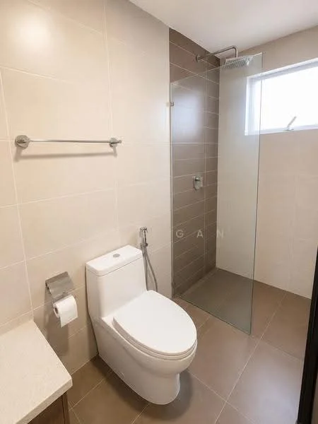 Bathroom features: white one-piece toilet, glass shower enclosure, handheld shower, wall-mounted shower faucet, light brown tile wall, beige tile flooring, chrome towel bar, window for natural light, toilet paper holder, bidet spray; style: modern.
