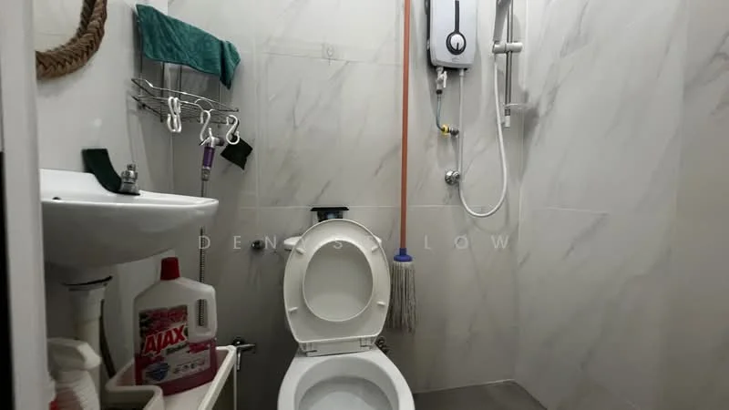 Bathroom features: white toilet, single-sink vanity with chrome faucet, shower with handheld showerhead, wall-mounted water heater, grey tile flooring, marble wall tiles, cleaning supplies visible, towel rack, mop, sponge, soap dispenser; style: modern.