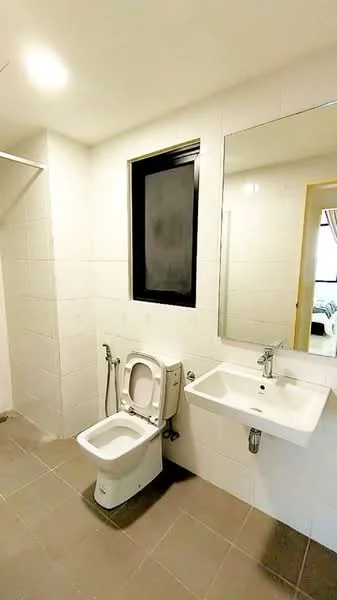 Bathroom features: white tiled walls, grey tiled flooring, single-sink vanity, chrome basin mixer faucet, framed mirror, one-piece toilet, window with black frame, shower hose attachment; style: modern.