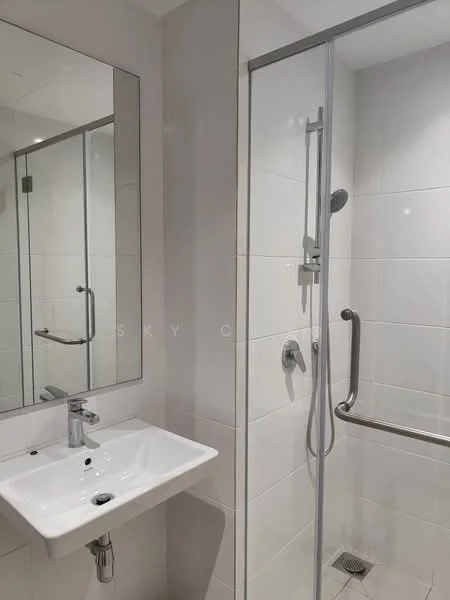 Bathroom features: white ceramic sink, chrome basin mixer faucet, mirror above sink, glass shower enclosure, handheld shower, wall-mounted shower head, white tiled walls, grey tile flooring, grab bar, shower drain; style: modern.