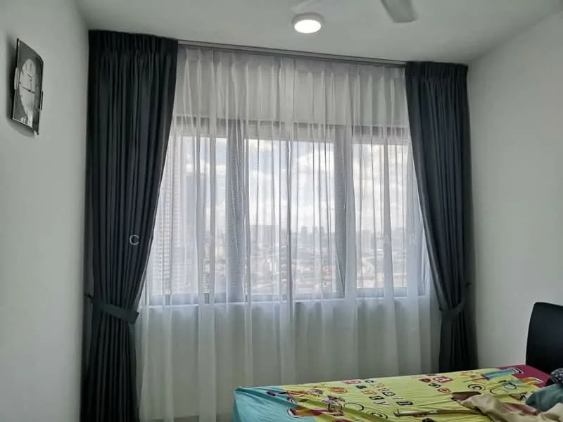 Bedroom features: white painted walls, floor-to-ceiling windows, sheer curtains, blackout curtains, ceiling fan, area rug with geometric pattern, bed with colorful bedding, framed artwork on wall; style: modern; view: city.