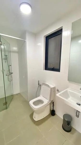 Bathroom features: white tiled walls, grey tiled flooring, walk-in shower with glass enclosure, chrome shower head, chrome handheld shower, single-sink vanity with white cabinet, framed mirror, one-piece toilet, window with black frame, ceiling light; style: modern.
