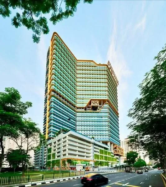 Exterior type: high-rise condominium; features: glass curtain wall, greenery on facade, recessed balconies, projecting balconies, multiple storeys, landscaped garden at base, modern architectural design, surrounded by mature trees; style: modern.