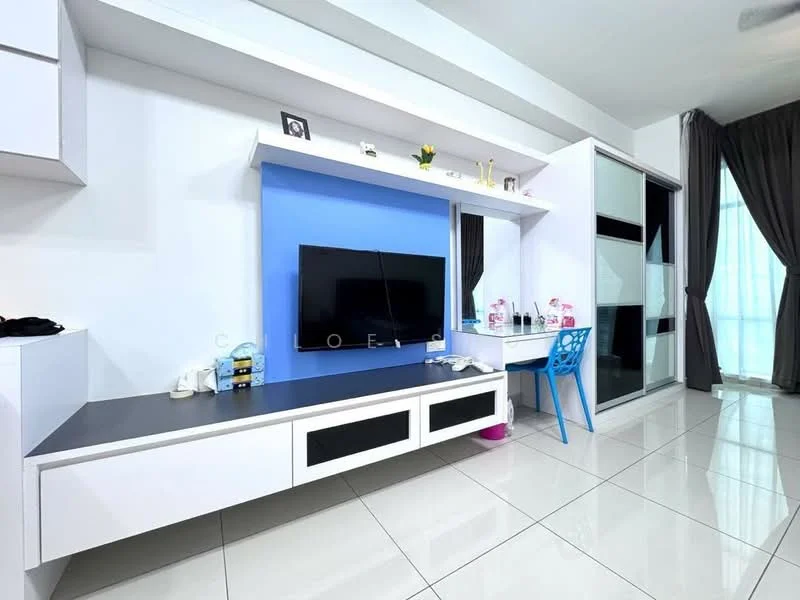 Living features: white wall-mounted TV unit, blue accent wall, flat-screen TV, white glossy cabinetry, black countertop, ceramic tile flooring, large window with sheer curtains, decorative plants, blue plastic chair, grey curtains; style: modern.