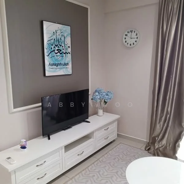 Living features: white TV console, black flat-screen TV, decorative wall art with Arabic calligraphy, round white coffee table, grey area rug with geometric pattern, beige curtains, light grey painted walls, wall clock; style: modern.