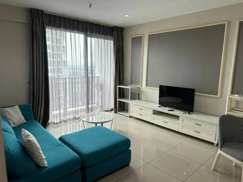 Living features: turquoise L-shape sectional sofa, glass coffee table, white TV console, wall-mounted TV, floor-to-ceiling windows, sheer curtains, grey accent wall, white tiled flooring, decorative wall frames; style: modern; view: city.