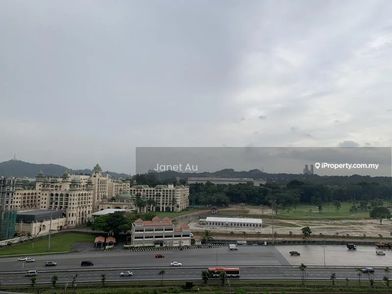 Exterior type: high-rise condominium; features: city skyline view, surrounded by greenery, adjacent to highway, manicured lawn, multiple buildings in view, parking area visible; style: modern.