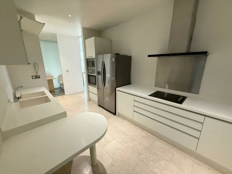 Kitchen features: white cabinetry, stainless-steel appliances, built-in oven, freestanding fridge, induction cooktop, single-bowl sink, chrome pull-down faucet, stone countertop, tile backsplash, recessed lighting, open layout, neutral tile flooring; style: modern.