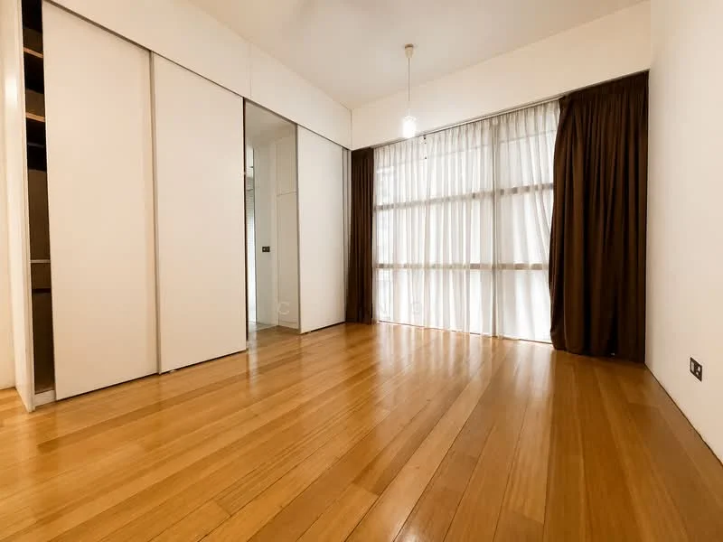Room features: wooden flooring, white painted walls, floor-to-ceiling windows, sheer curtains, brown curtains, recessed downlights, built-in wardrobe with sliding doors, single pendant light; style: modern.