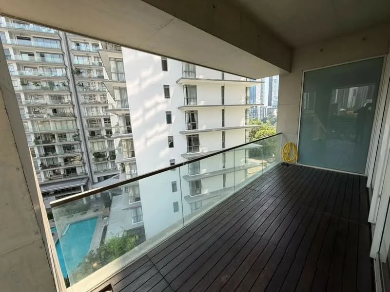 Balcony features: wooden decking, glass railing, concrete ceiling, view of neighboring buildings, view of swimming pool, yellow hose, open space, natural light; style: modern; view: pool.