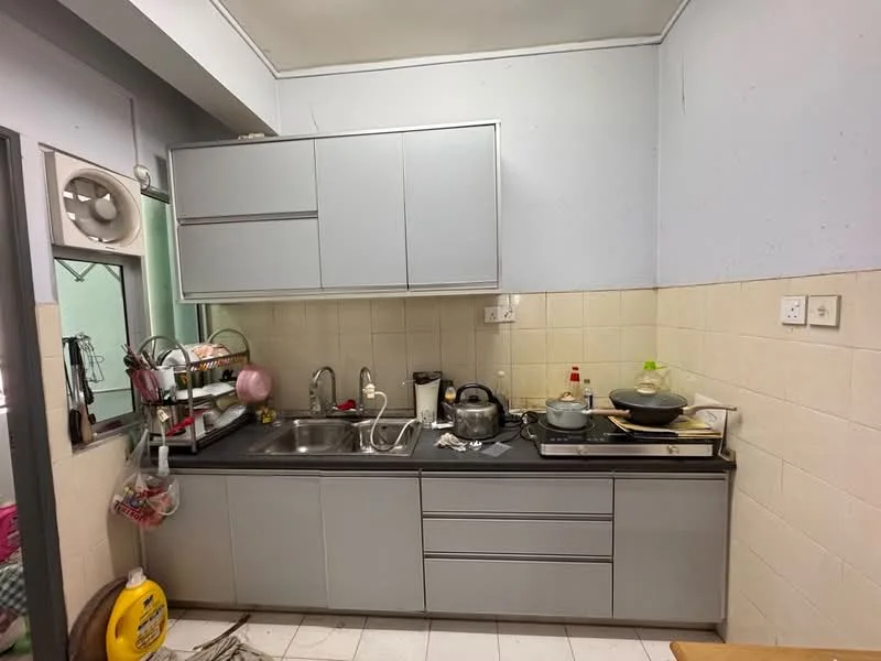 Kitchen features: grey cabinetry, black countertop, single-bowl stainless-steel sink, chrome pull-down faucet, built-in stove, kettle, cooking pot, saucepan, dish rack, wall-mounted exhaust fan, tile backsplash, white tiled flooring, window with sheer curtains; style: modern.