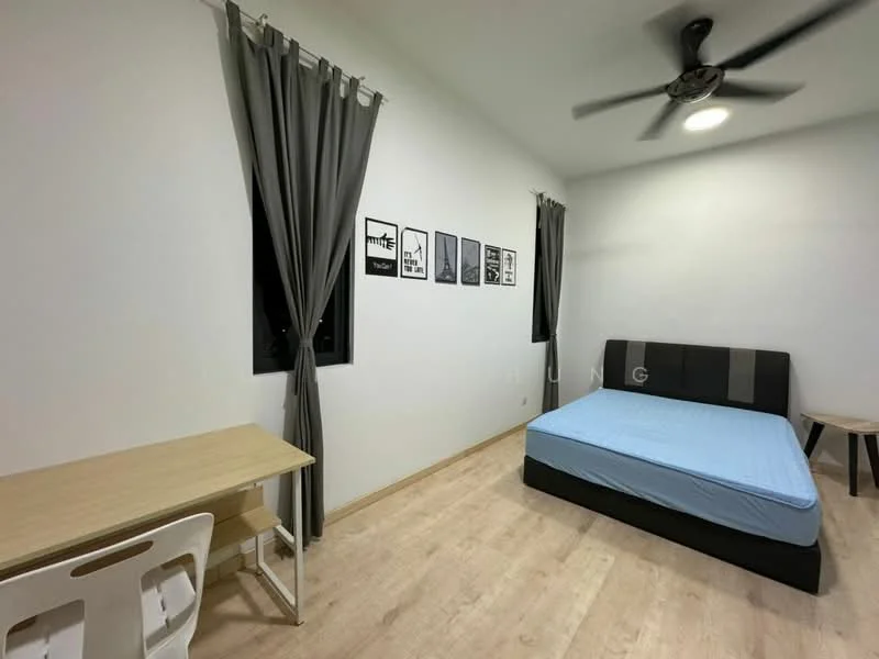 Bedroom features: queen-size bed with black and grey bedding, wooden flooring, white painted walls, 5-blade ceiling fan with light, black curtains, framed artwork on walls, study desk with light wood finish, white plastic chair, nightstand with light wood finish, window with black frame; style: modern.