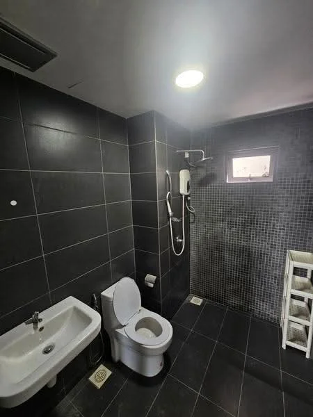 Bathroom features: black tiled walls, black tiled flooring, single-sink vanity, chrome basin mixer faucet, one-piece toilet, handheld shower, shower head, window for natural light, wall-mounted water heater, towel rack; style: modern.
