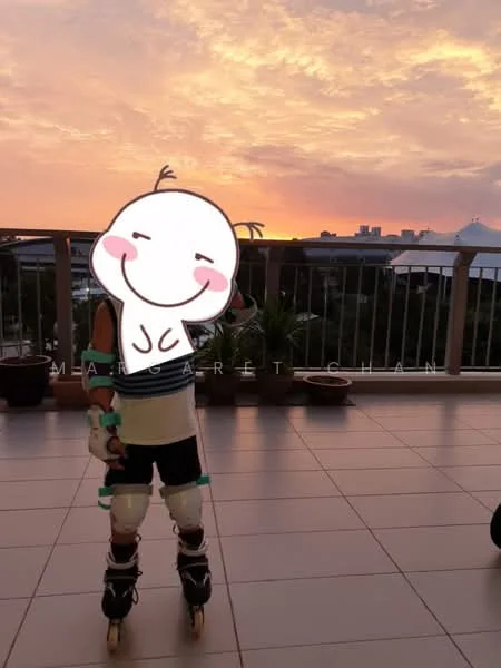 Room features: tile flooring, balcony railing, outdoor plants, sunset view, open space, roller skating gear; view: city.