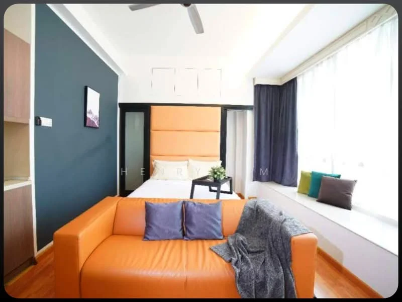 Living features: orange leather sofa, decorative cushions in grey and purple, wooden flooring, floor-to-ceiling windows, sheer curtains, blue accent wall, bed with orange headboard, built-in wardrobe, window seat with cushions, ceiling fan; style: modern.