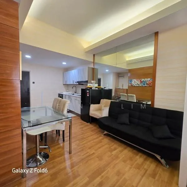 Living features: black fabric sofa with cushions, glass dining table with chrome legs, 4 dining chairs, wooden flooring, recessed downlights, mirrored wall, kitchen area with cabinets, stainless-steel fridge, built-in kitchen cabinets, countertop with sink, wall-mounted artwork; style: modern.