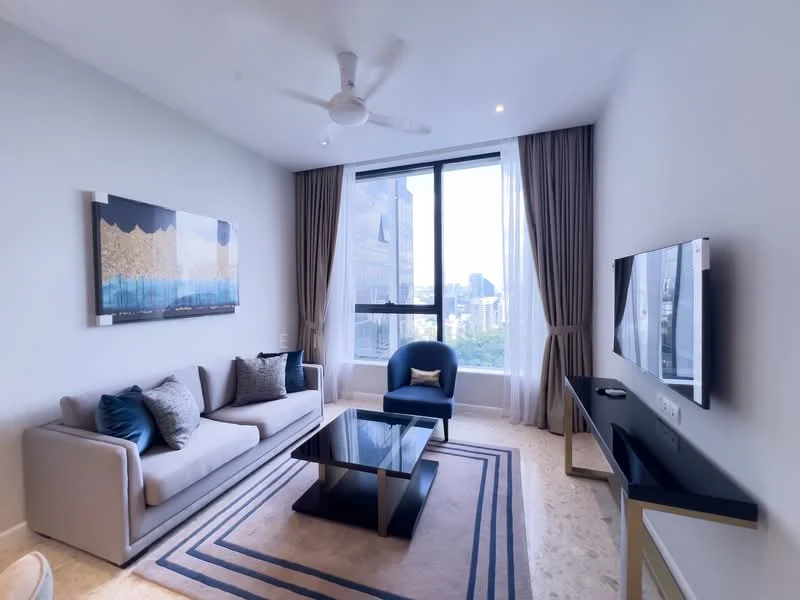 Living features: 3-seater fabric sofa in light grey, accent chair in blue, glass coffee table, TV console, wall-mounted TV, floor-to-ceiling windows, sheer curtains, recessed downlights, ceiling fan, area rug with geometric pattern, decorative wall art; style: modern; view: city.