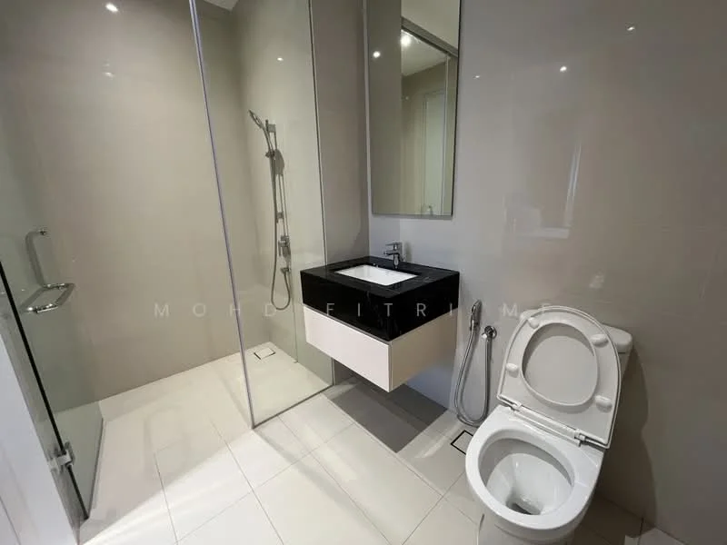 Bathroom features: walk-in shower with glass enclosure, rain shower head, single-sink vanity with black countertop, white ceramic sink, chrome basin mixer faucet, framed mirror, one-piece toilet, bidet spray, white tiled walls, light-colored tile flooring, wall-mounted storage, recessed lighting; style: modern.