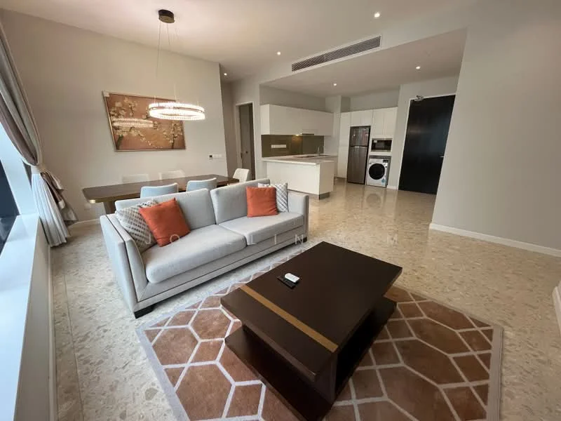 Living features: 3-seater fabric sofa in light grey, orange accent cushions, coffee table with dark wood finish, area rug with geometric pattern, wall-mounted TV, recessed downlights, large windows with sheer curtains, dining table with 6 chairs in background, open-plan layout connecting to kitchen, polished marble flooring, neutral painted walls, decorative wall art; style: modern; view: city. Kitchen features: white cabinetry, stainless-steel appliances, built-in oven, freestanding washing machine, granite countertop, kitchen island with seating, ceramic tile backsplash, recessed downlights; style: modern.