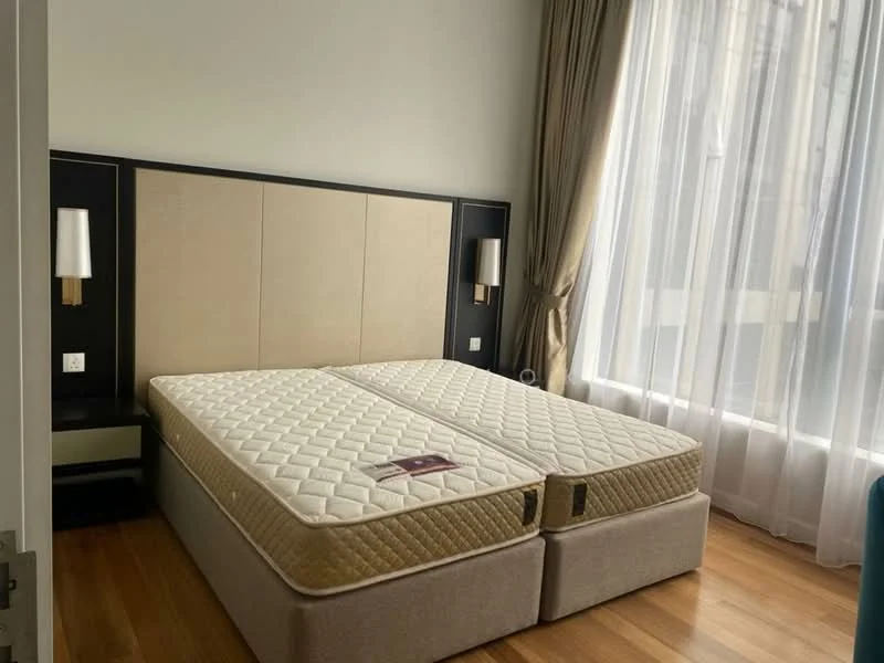Bedroom features: king-size bed, upholstered headboard, bedside lamps, wooden flooring, floor-to-ceiling windows with sheer curtains, light-colored walls, decorative wall paneling, built-in wardrobe; style: modern.