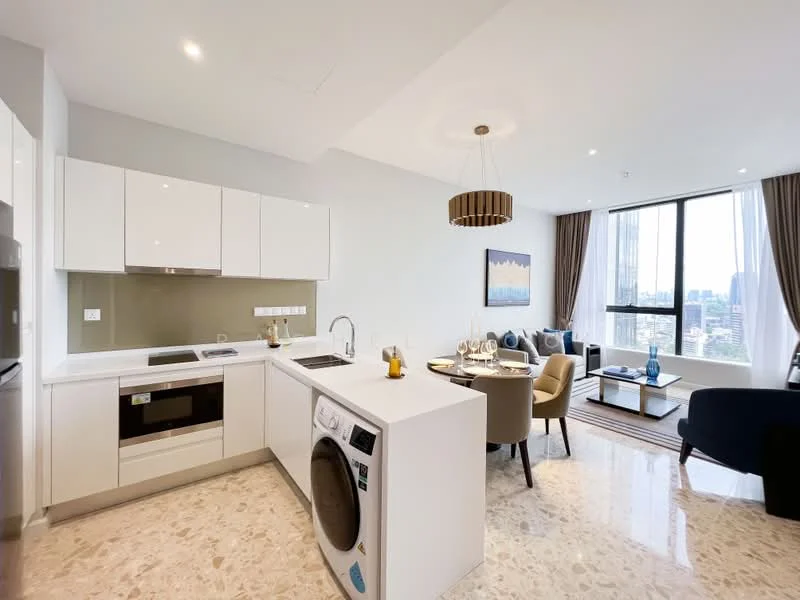 Kitchen features: white cabinetry, marble countertop, stainless-steel sink, chrome pull-down faucet, built-in oven, induction cooktop, washer-dryer combo, refrigerator, pendant light, open-plan layout, floor-to-ceiling windows, city view, cream-colored walls, polished stone flooring; style: modern; view: city. Living features: sofa in navy blue, armchair, round dining table, upholstered dining chairs, decorative artwork, curtains, area rug, TV console, wall-mounted TV; style: modern; view: city.