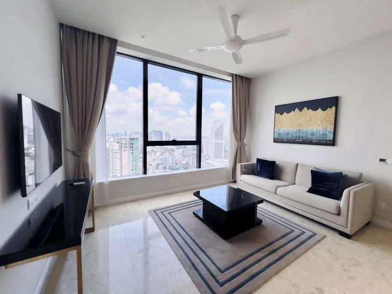 Living features: floor-to-ceiling windows, cream painted walls, marble flooring, 3-seater fabric sofa in light grey, black coffee table, TV console, wall-mounted TV, decorative artwork, sheer curtains, ceiling fan with light, area rug with geometric pattern; style: modern; view: city.