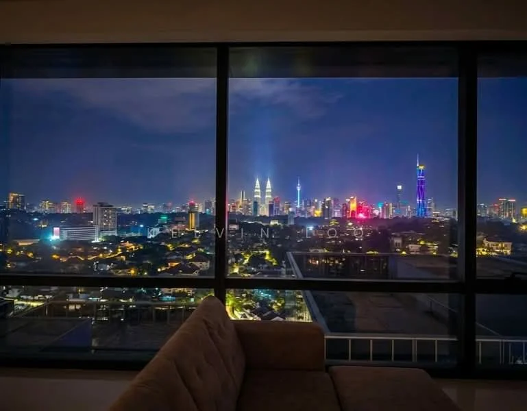 Room features: large floor-to-ceiling windows, city skyline view, nighttime lighting, sofa in foreground; style: modern; view: city.