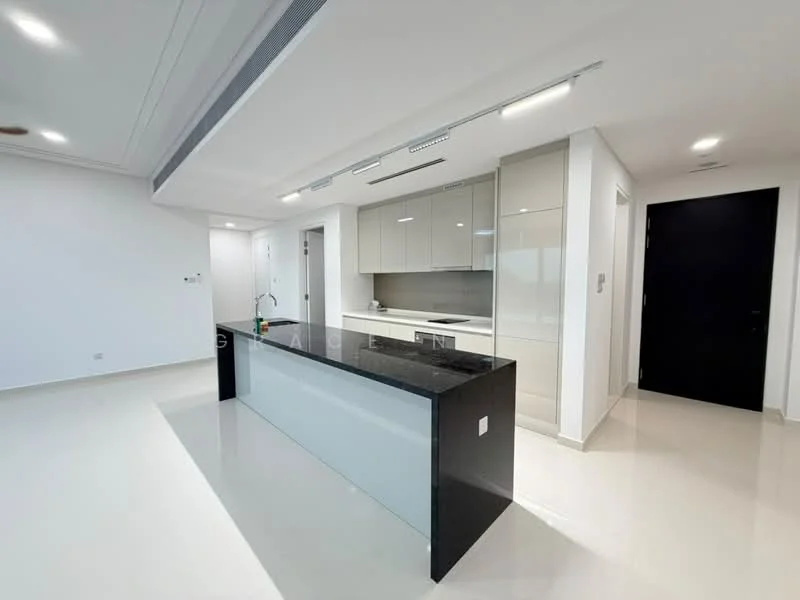 Kitchen features: island countertop with black granite surface, white cabinetry with flat-panel design, built-in oven, stainless-steel sink, chrome pull-down faucet, recessed LED downlights, white walls, cream tiled flooring, open layout, wall-mounted cabinets, grey backsplash, sliding door to hallway; style: modern.