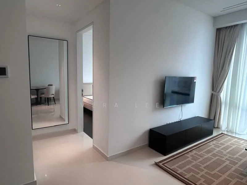 Living features: white painted walls, polished tile flooring, floor-to-ceiling windows, sheer curtains, wall-mounted TV, TV console in black, area rug with geometric pattern, mirror on wall; style: modern. Room features: doorway leading to another room.