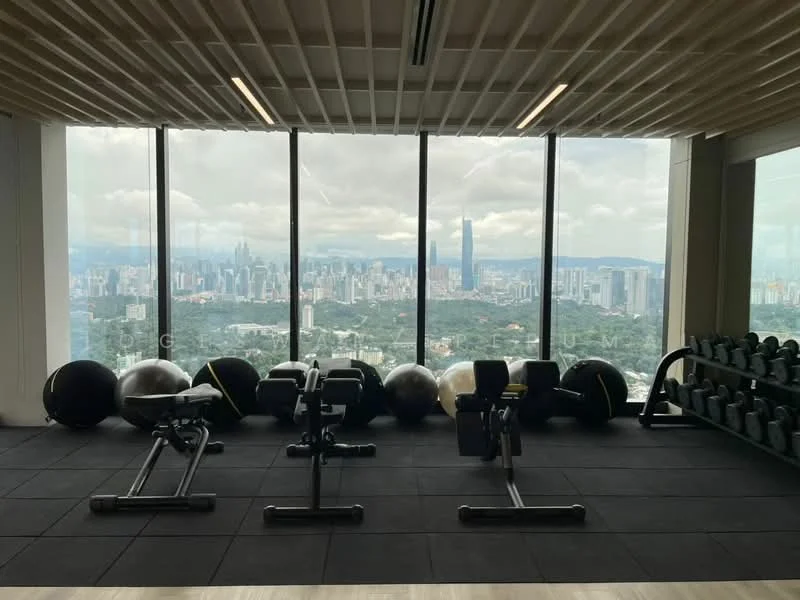 Room features: large floor-to-ceiling windows, city skyline view, rubber flooring, exercise balls, dumbbells, weight benches, exercise mats, open space layout, modern lighting, high ceiling; style: modern; view: city.