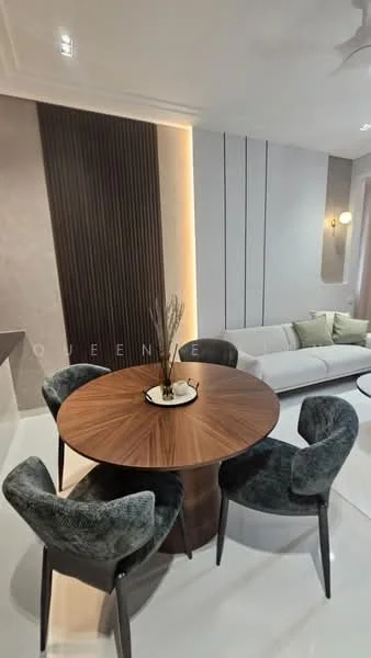 Dining features: round wooden dining table, 4 upholstered dining chairs in grey, white walls, accent wall with vertical wood panels, recessed lighting, polished tile flooring, decorative vase on table, sofa in background, green cushions on sofa, wall-mounted sconce lighting; style: modern.
