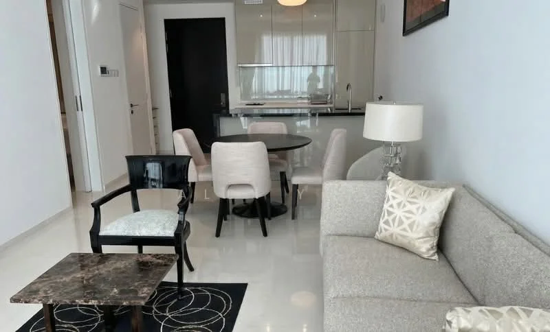 Living features: light grey fabric sofa, decorative cushion with geometric pattern, black wooden armchair, round dining table, upholstered dining chairs, marble coffee table, area rug with circular pattern, recessed ceiling lights, floor-to-ceiling windows with sheer curtains, white painted walls, glossy tile flooring; style: modern.