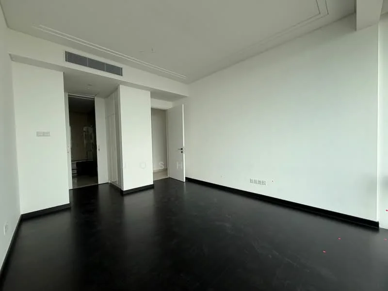 Room features: white painted walls, black laminate flooring, ceiling with crown moulding, doorway leading to another room, built-in wardrobe, natural light from windows; style: modern.