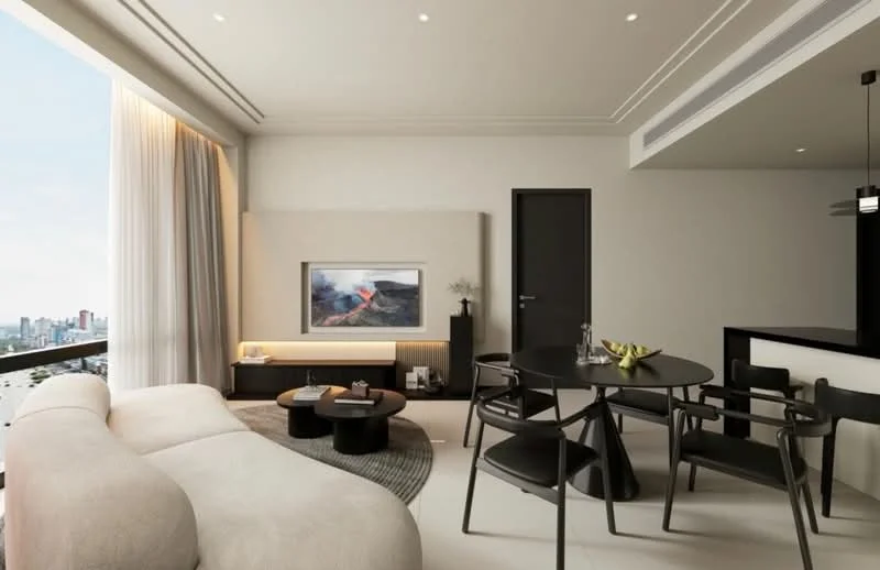 Living features: light grey fabric sofa, round coffee table, black dining table, black dining chairs, TV console with wall-mounted TV, decorative wall art, floor-to-ceiling windows, sheer curtains, recessed downlights, white painted walls, light-colored flooring, area rug with circular pattern; style: modern; view: city.
