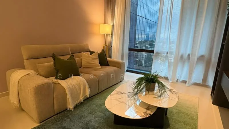 Living features: 3-seater fabric sofa in beige, decorative cushions in green and cream, coffee table with marble top, area rug in green, floor-to-ceiling windows, sheer curtains, potted plant on coffee table, light-colored walls, recessed downlights; style: modern; view: city.