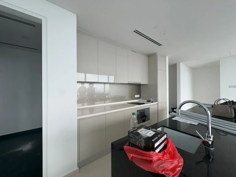 Kitchen features: white cabinetry, black granite countertop, stainless-steel sink, chrome pull-down faucet, glass backsplash, built-in oven, freestanding range oven, refrigerator, island with storage, under-cabinet lighting, open layout, floor-to-ceiling windows, light-colored tile flooring; style: modern. Room features: unfinished walls, black flooring, natural light from windows.