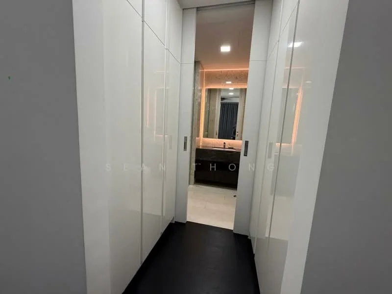 Room features: white cabinetry, black flooring, recessed lighting, mirror with backlighting, vanity area, neutral wall color, modern design, spacious hallway; style: modern.