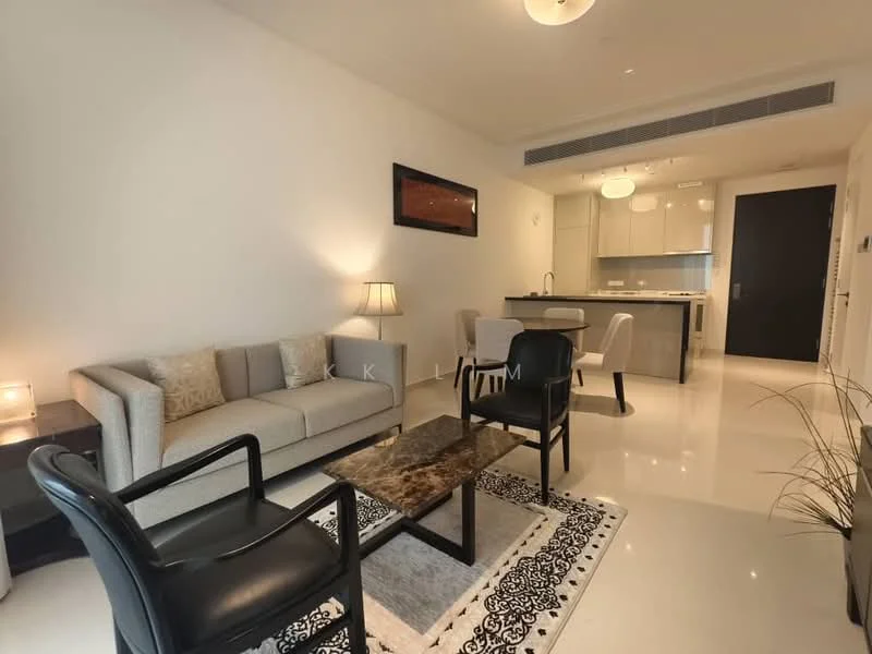 Living features: light grey fabric sofa, black armchair, coffee table with marble top, area rug with geometric pattern, table lamp, wall-mounted artwork, recessed ceiling lights, white painted walls, polished tile flooring, open layout to kitchen, dining area with chairs visible in background; style: modern.